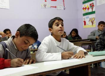 Muhanad and Ahmad, refugees from Syria in school in Lebanon's Bekaa Valley
